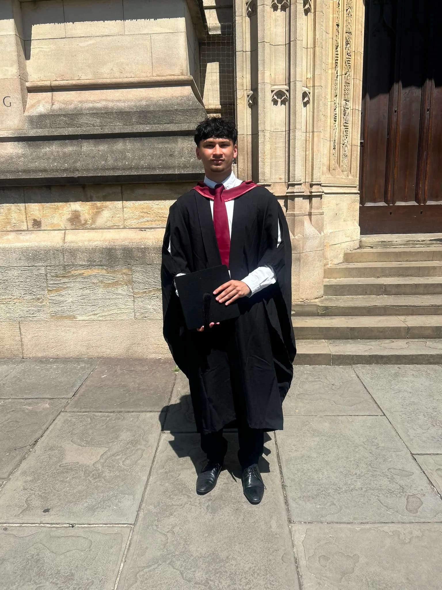 Hasan Yousaf, founder and full-time tutor at Elevate Tuition, in his graduation gown